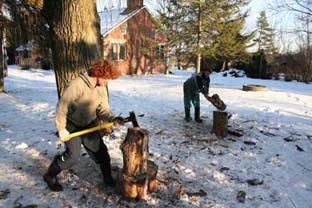 Splitting firewood by the farmhouse